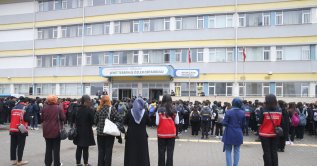 Students and teachers hold a memorial ceremony for the teacher and students killed in a school shooting, Kahramanmaraş, Türkiye, April 20, 2026. (AA Photo) 