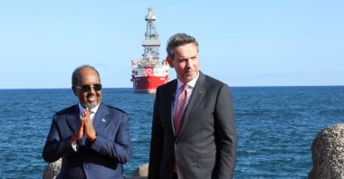 Energy Minister Alparslan Bayraktar (R) and Somali President Hassan Sheikh Mohamud attend the ceremony to launch the Turkish drilling vessel Cağrı Bey, which is set to conduct Türkiye's first deep-sea drilling operation near Mogadishu's sea port, Mogadishu, Somalia, April 10, 2026. (Reuters Photo)