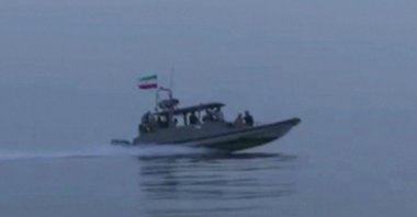 An Iranian Revolutionary Guards boat taking part in an operation to seize ships attempting to cross the Strait of Hormuz, April 23, 2026. (AFP Photo)
