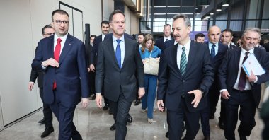 NATO Secretary-General Mark Rutte (C), Türkiye Defense Industries President Haluk Görgün (R) and  Aselsan General Manager Ahmet Akyol visit the defense firm Aselsan as part of Rutte's official visit, Ankara, Türkiye, April 22, 2026. (AFP Photo)