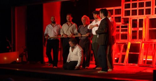 In an undated photo from the DHA archive, actors are seen performing on stage as part of the "Theatre Train" project. (DHA Photo)