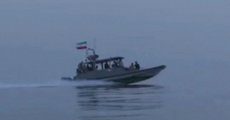 An Iranian Revolutionary Guards boat taking part in an operation to seize ships attempting to cross the Strait of Hormuz, April 23, 2026. (AFP Photo)