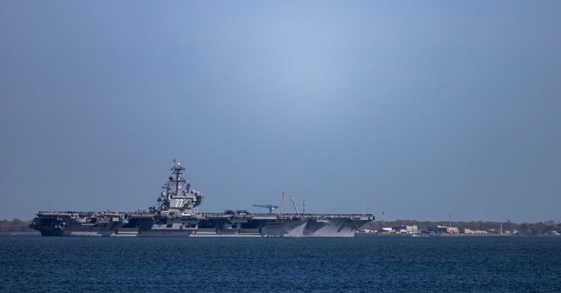 The USS George H.W. Bush (CVN 77) travels on the James River toward the Hampton Roads Bridge-Tunnel after departing from Naval Station Norfolk in Norfolk, Virginia, U.S., March 31, 2026. (AP Photo)