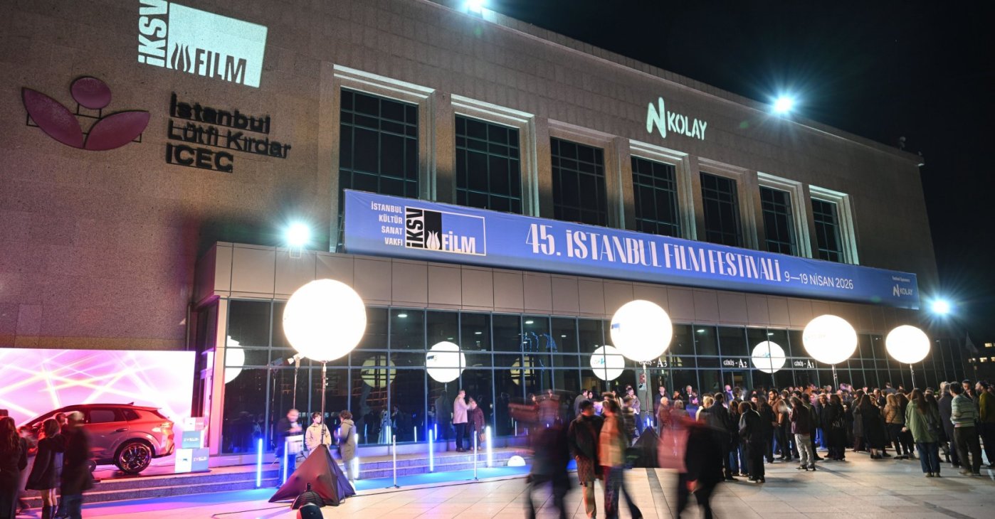 People walk by the opening ceremony of the Istanbul Film Festival at the Lütfi Kırdar Congress Center, Istanbul, Türkiye, April 8, 2026. (AA Photo)
