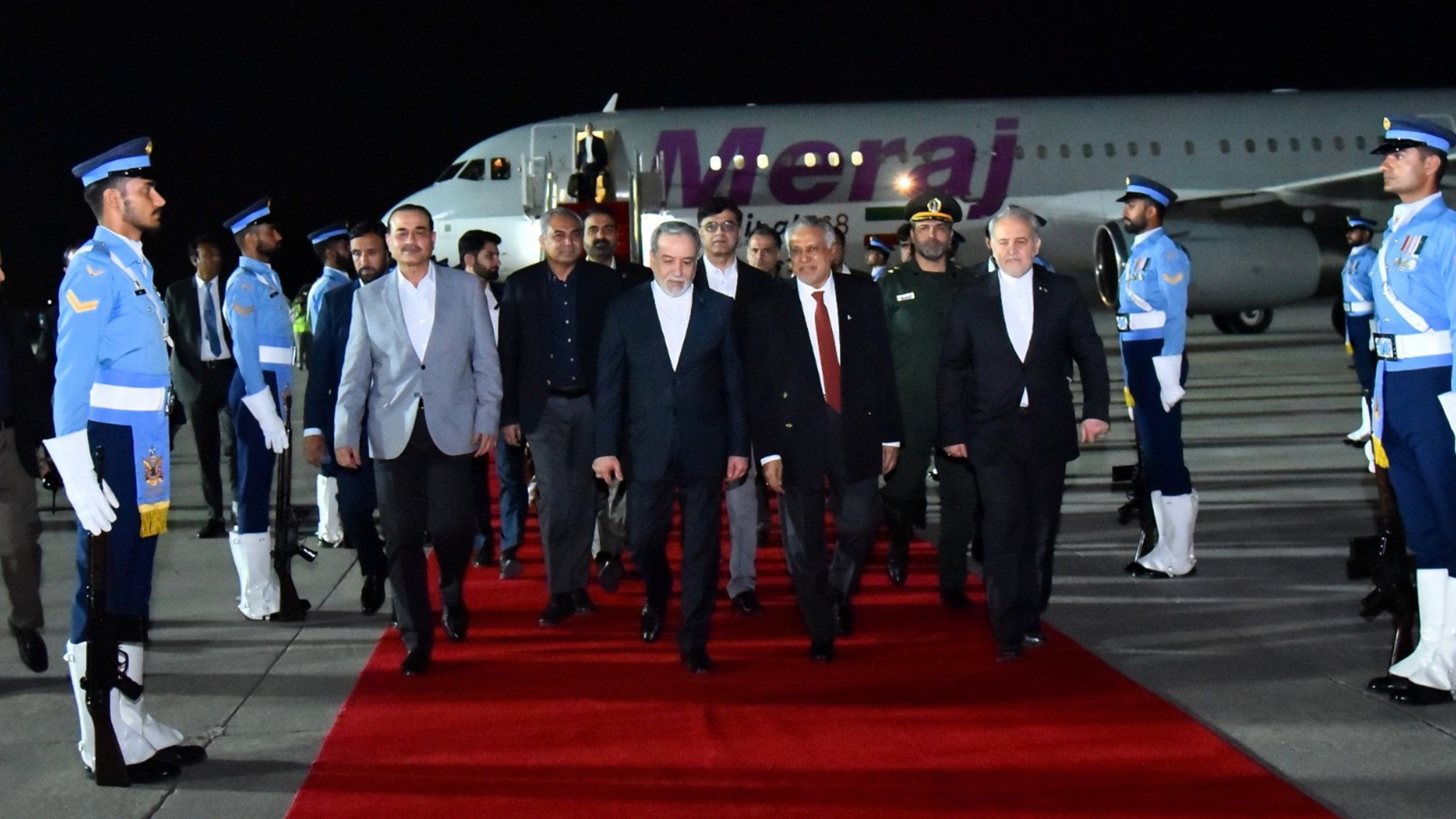 Iranian Foreign Minister Abbas Araghchi walks with Pakistan's Deputy Prime Minister Ishaq Dar (R) and Field Marshal Asim Munir at Nur Khan Airbase in Rawalpindi, Pakistan, April 24, 2026. (Pakistan Foreign Ministry Handout via EPA)