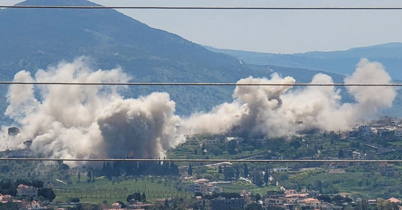 Smoke billows from explosions in the southern village of Khiam where the Israeli army has detonated residential homes, Lebanon, April 25, 2026. (AFP Photo)
