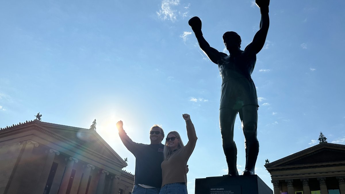 Visitors pose in front of the Rocky statue at the Philadelphia Museum of Art, Philadelphia, U.S., April 22, 2026. (AP Photo)