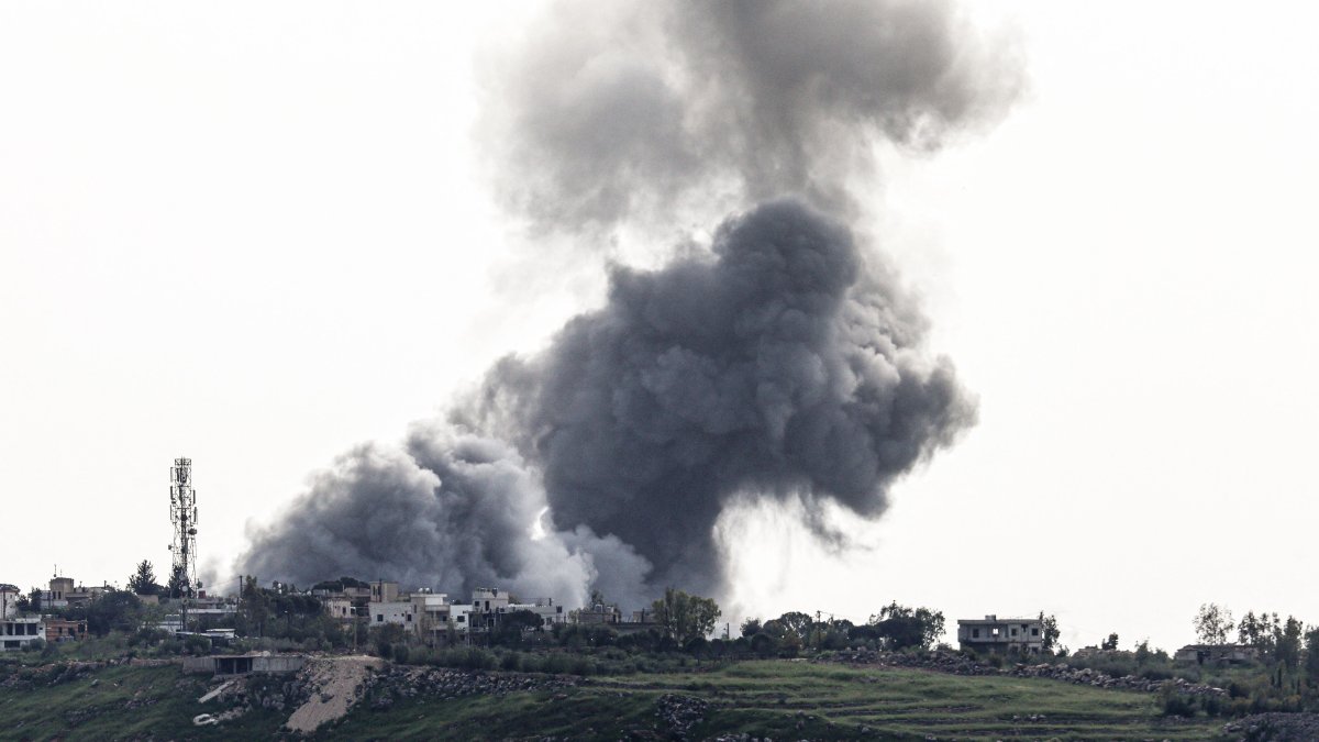 Smoke rises from targeted areas following an Israeli airstrike in the town of Arnoun, Nabatieh province, Lebanon, April 26, 2026. (AFP Photo)