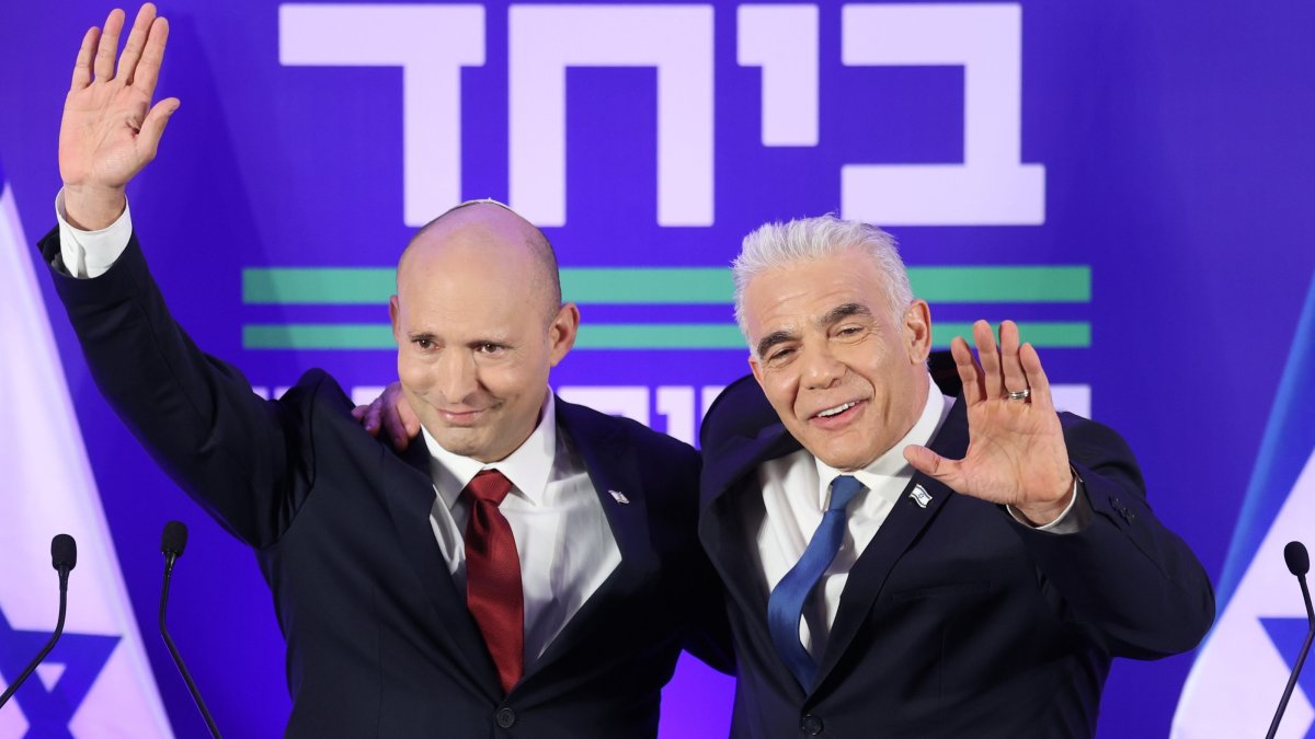 Former Israeli prime ministers Naftali Bennett (L) and Yair Lapid (R) hold a joint press conference in Herzliya, Israel, April 26, 2026. (EPA Photo)
