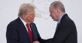 President Donald Trump greets President Recep Tayyip Erdoğan during a summit in Sharm El Sheikh, Egypt, Oct. 13, 2025. (AP Photo) 