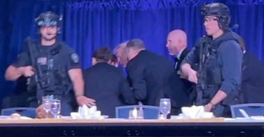 U.S. President Donald Trump is escorted out as a shooter opens fire during the annual White House Correspondents' Association dinner in Washington, D.C., U.S., April 25, 2026. (Reuters Photo)