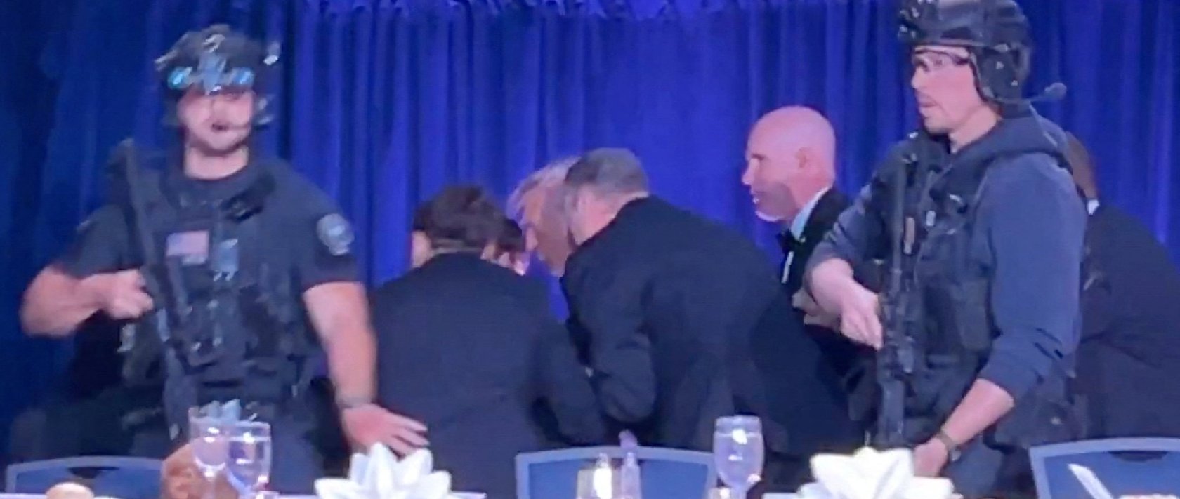 U.S. President Donald Trump is escorted out as a shooter opens fire during the annual White House Correspondents' Association dinner in Washington, D.C., U.S., April 25, 2026. (Reuters Photo)