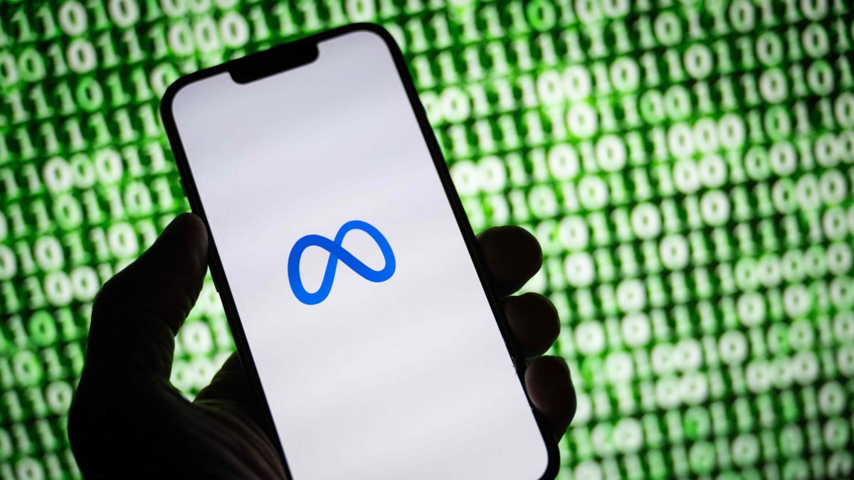 This illustration shows the Meta logo on a smartphone, Mulhouse, France, Oct. 30, 2023. (AFP Photo)