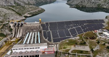 A drone view of the reservoir, dam and solar panels at the hydroelectric power plant, Vau i Dejes, Albania, April 13, 2026. (Reuters Photo)