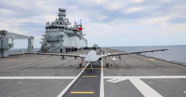 A Bayraktar TB3 combat drone is seen on the deck of the TCG Anadolu aircraft carrier during the live-fire phase of the "Blue Homeland-2026" tactical military exercises in the eastern Mediterranean Sea, April 9, 2026. (AFP Photo)