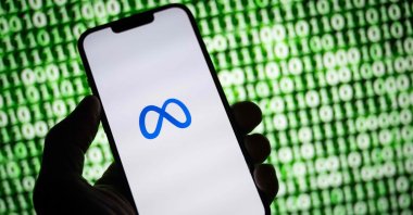 This illustration shows the Meta logo on a smartphone, Mulhouse, France, Oct. 30, 2023. (AFP Photo)