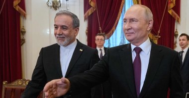 Russian President Vladimir Putin (R) and Iranian Foreign Minister Abbas Araghchi before a meeting in Saint Petersburg, Russia, April 27, 2026. (AFP Photo)