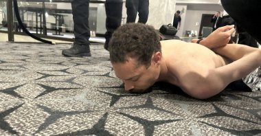Law enforcement personnel detain Cole Tomas Allen, a suspect in the shooting incident at the White House Correspondents' Association dinner, in Washington, D.C., U.S., April 25, 2026. (Reuters Photo)