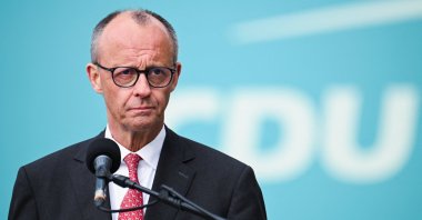 German Chancellor Friedrich Merz looks on during a press statement during the CDU/CSU parliamentary group’s executive committee meeting in Berlin, Germany, April 27, 2026. (Reuters Photo)