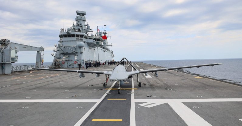 A Bayraktar TB3 combat drone is seen on the deck of the TCG Anadolu aircraft carrier during the live-fire phase of the "Blue Homeland-2026" tactical military exercises in the eastern Mediterranean Sea, April 9, 2026. (AFP Photo)