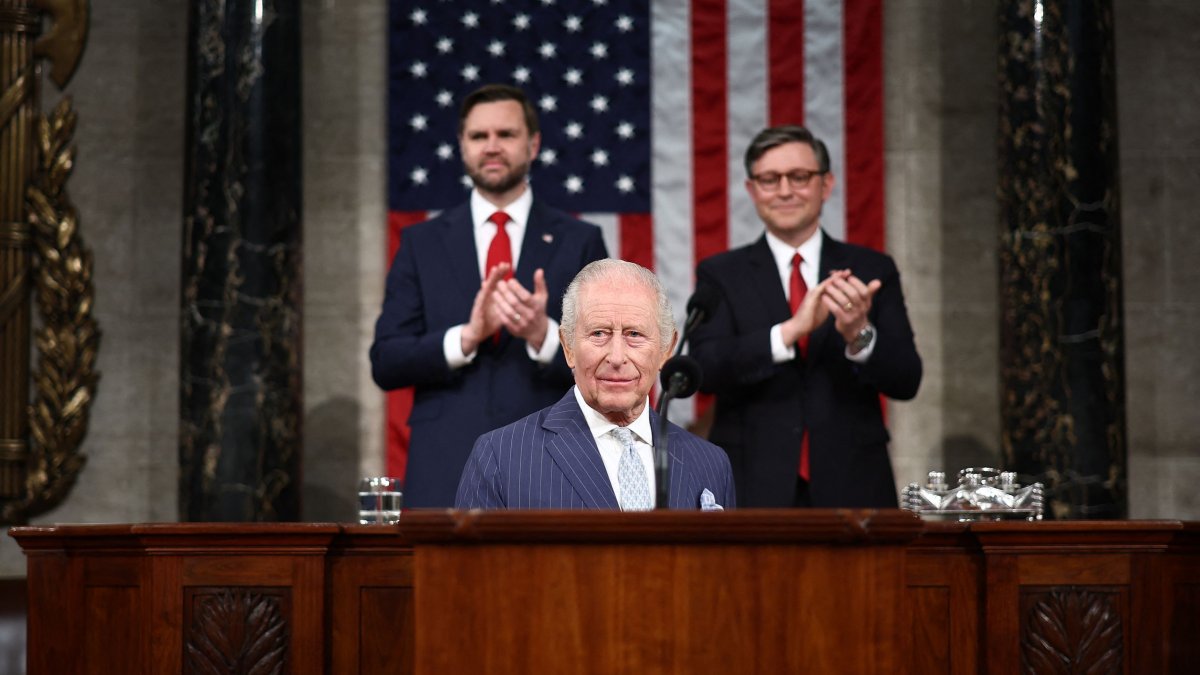 U.S. Vice President JD Vance and House Speaker Mike Johnson applaud as Britain's King Charles III arrives to address a Joint Meeting of Congress in the House Chamber at the US Capitol in Washington, DC, U.S., April 28, 2026. (AFP Photo)