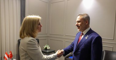 Foreign Minister Hakan Fidan (R) shakes hands with Austria's top diplomat Beate Meinl-Reisinger at a meeting, Antalya, southern Türkiye, April 17, 2026. (AA Photo)