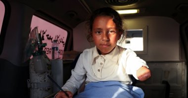 A wounded Palestinian girl, evacuated from Gaza for medical treatment, arrives in an ambulance at the King Hussein Bridge, Jordan, April 27, 2026. (Reuters Photo)