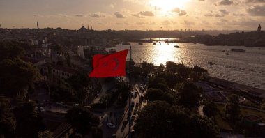 An aerial view of the Bosporus with the Turkish flag fluttering in the wind, Istanbul, Türkiye, June 21, 2024. (Reuters Photo)