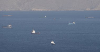 Ships and tankers in the Strait of Hormuz off the coast of Musandam, Oman, April 18, 2026. (Reuters Photo)
