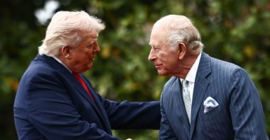 U.S. President Donald Trump and Britain's King Charles III shake hands during an arrival ceremony on the South Lawn of the White House in Washington, DC, U.S., April 28, 2026. (AFP Photo)