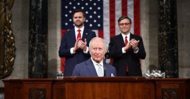 U.S. Vice President JD Vance and House Speaker Mike Johnson applaud as Britain's King Charles III arrives to address a Joint Meeting of Congress in the House Chamber at the US Capitol in Washington, DC, U.S., April 28, 2026. (AFP Photo)