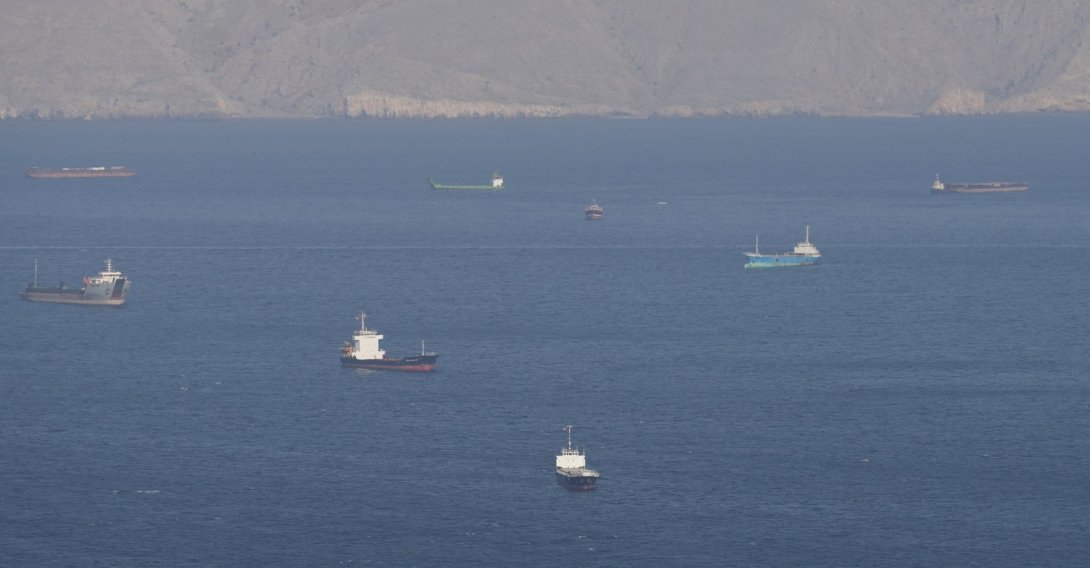 Ships and tankers in the Strait of Hormuz off the coast of Musandam, Oman, April 18, 2026. (Reuters Photo)