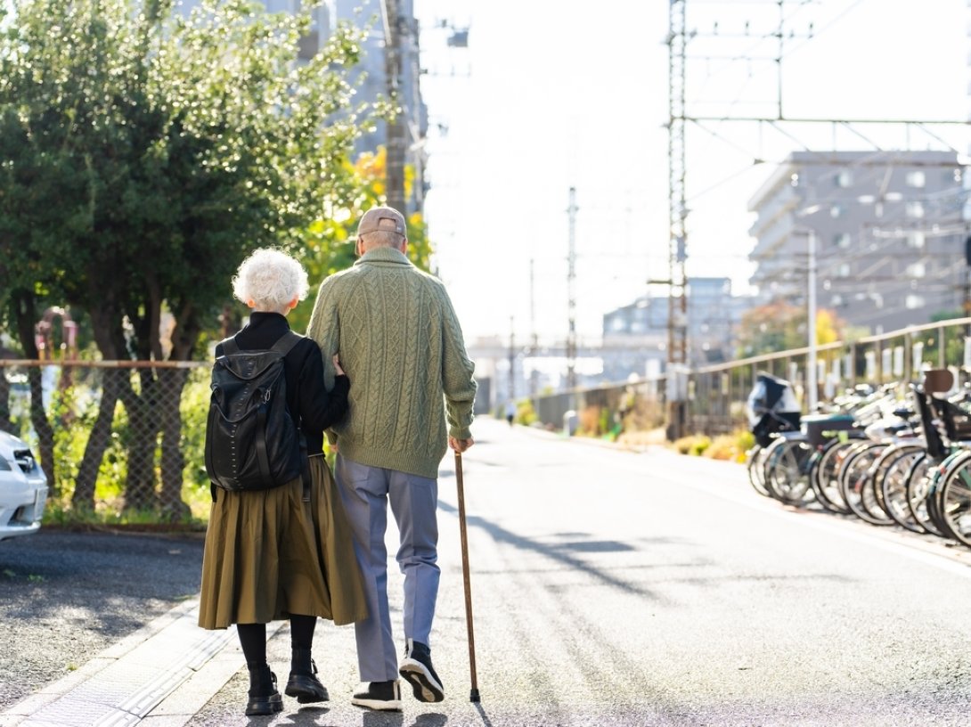 A senior couple walking together. (Shutterstock Photo)