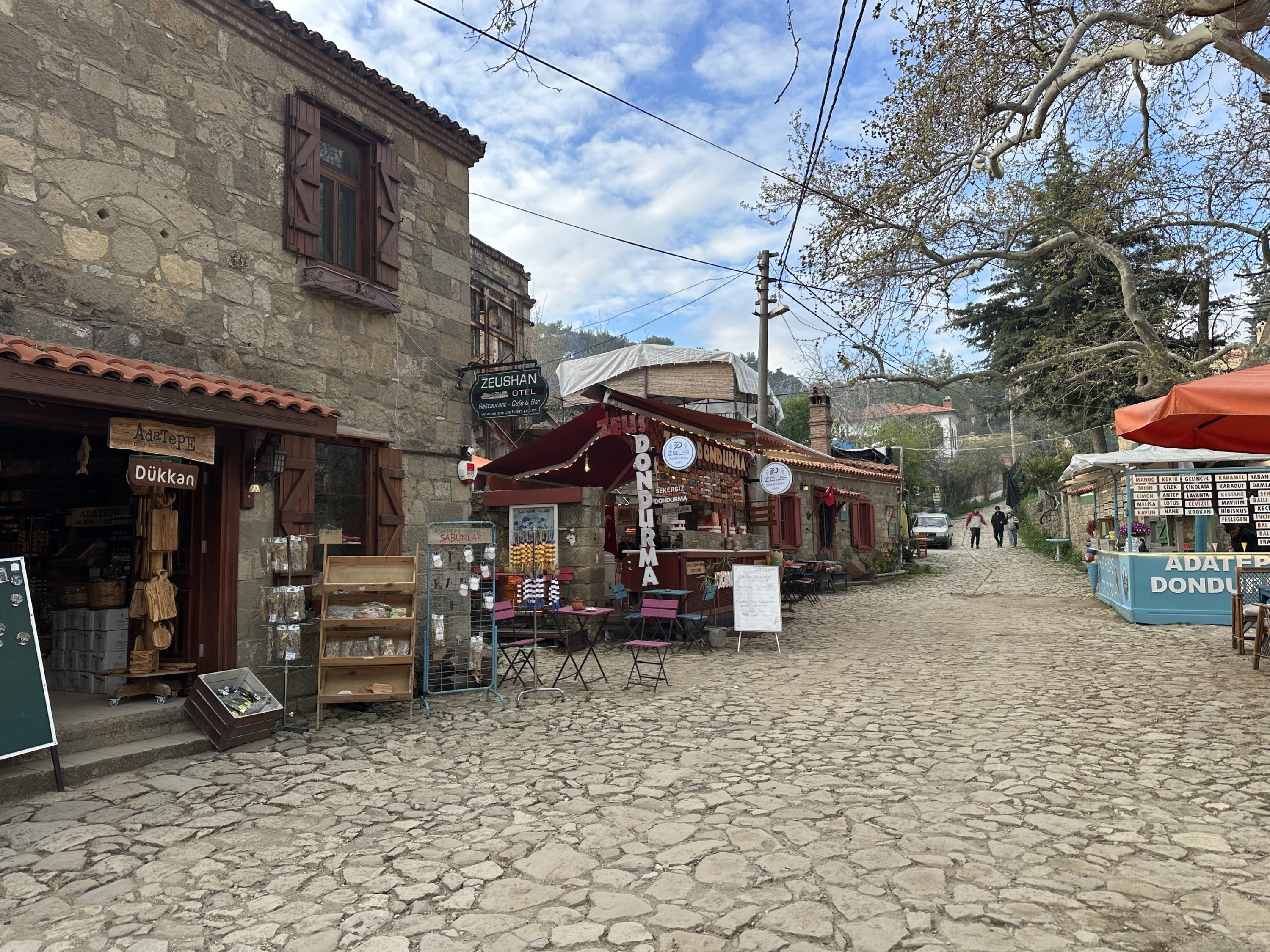 Small shops along the way at historic Adatepe village, Çanakkale, northwestern Türkiye, April 11, 2026. (AA Photo)