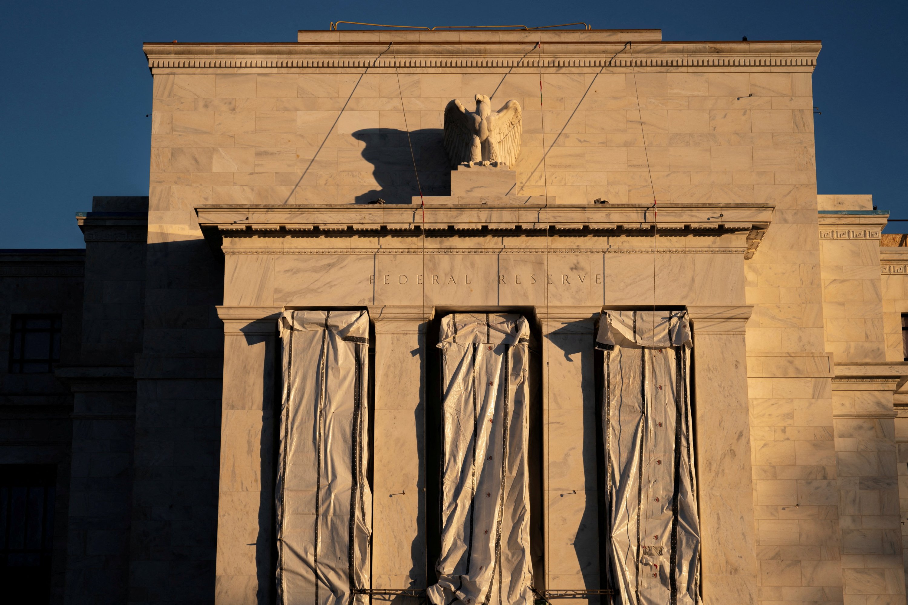 US Fed holds rates steady again, signals possible cuts amid rare dissent