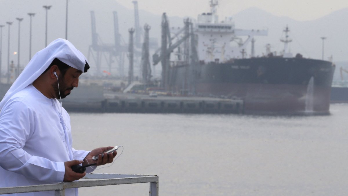 An Emirati man stands during the inauguration ceremony of a dock for supertankers at the oil terminal of Fujairah, UAE, Sept. 21, 2016. (AFP Photo)