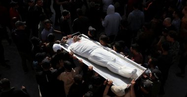 Mourners attend the funeral of Palestinians who were killed today in an Israeli strike, according to medics, at Al-Shifa Hospital in Gaza City, April 28, 2026. (Reuters Photo)