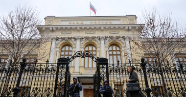 A flag flies above the headquarters of the Russian Central Bank on the day of a key rate-setting meeting in Moscow, Russia, April 24, 2026. (Reuters Photo)