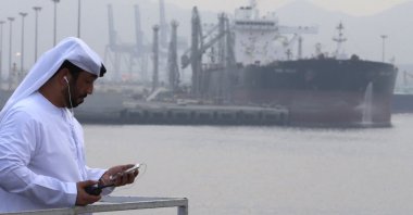 An Emirati man stands during the inauguration ceremony of a dock for supertankers at the oil terminal of Fujairah, UAE, Sept. 21, 2016. (AFP Photo)