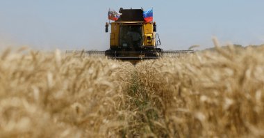 A farmer operates a combine during the start of the wheat harvesting campaign in a field near the town of Starobilsk (Starobelsk) in the Luhansk Region, a Russian-controlled area of Ukraine, July 9, 2025. (Reuters File Photo)