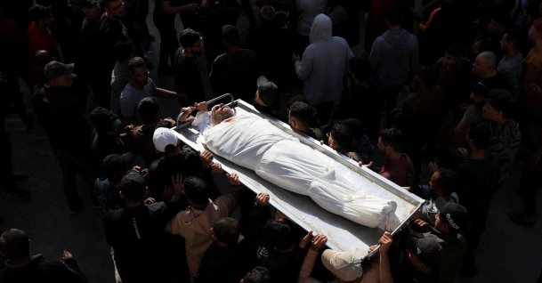 Mourners attend the funeral of Palestinians who were killed today in an Israeli strike, according to medics, at Al-Shifa Hospital in Gaza City, April 28, 2026. (Reuters Photo)