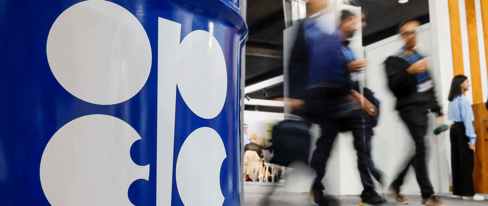 People walk past an installation depicting a barrel of oil with the logo of the Organization of the Petroleum Exporting Countries (OPEC) during the COP29 United Nations climate change conference, Baku, Azerbaijan, Nov. 19, 2024. (Reuters Photo)