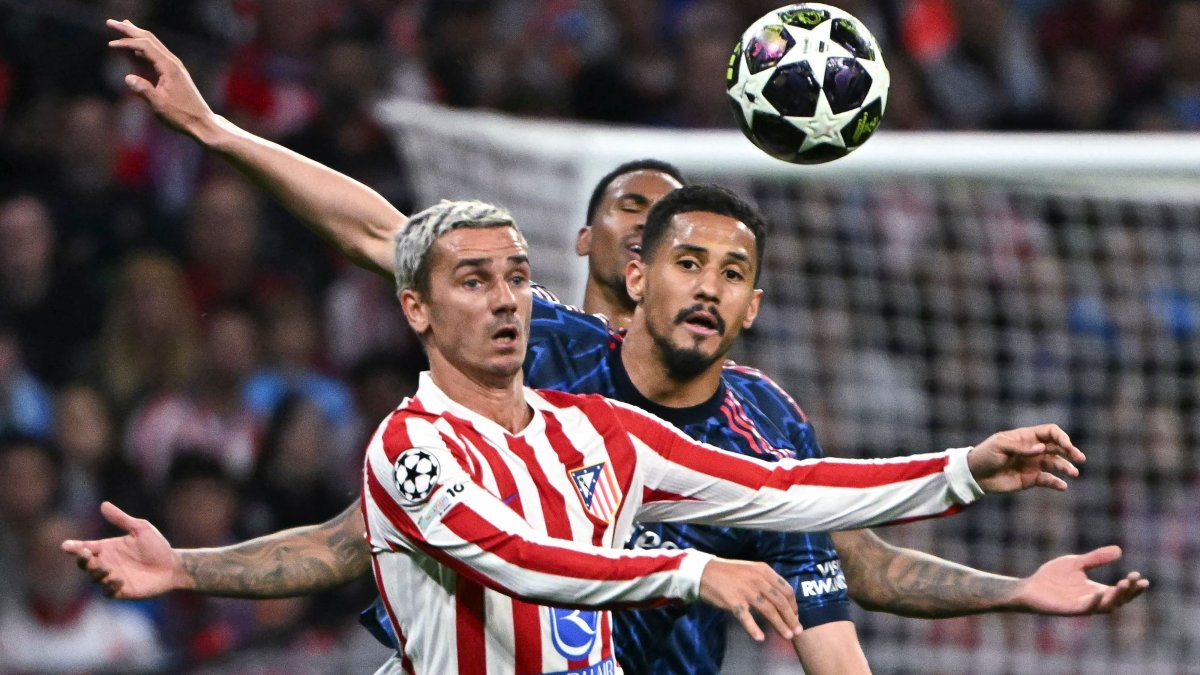 Arsenal's Gabriel Magalhaes (R) vies for the ball with Atletico Madrid's Antoine Griezmann during their UEFA Champions League semifinal first leg match, in Madrid, Spain, April 29, 2026. (AFP Photo)