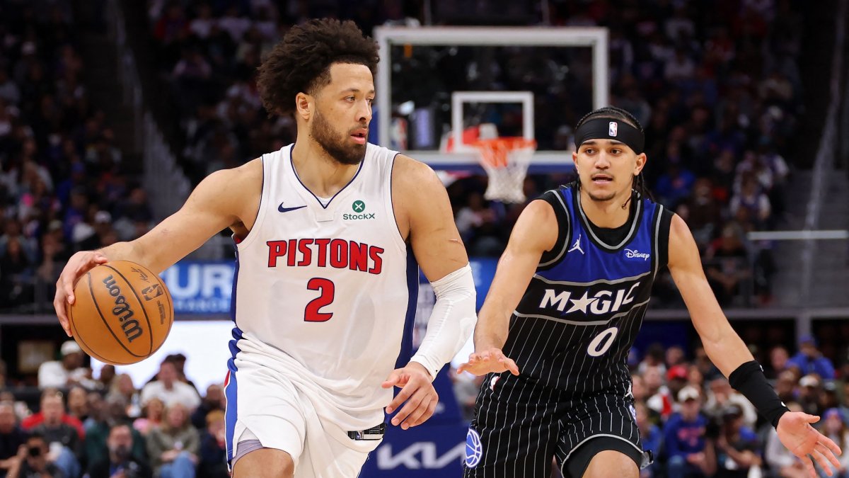 Pistons' Cade Cunningham is pursued by Magic's Anthony Black during an NBA Playoffs game in Detroit, Michigan, April 29, 2026. (AFP Photo)