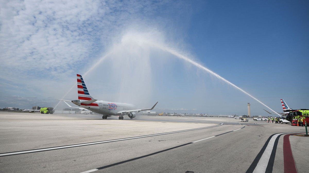 American Airlines Flight 3599, operating from Miami International Airport to Caracas, Venezuela, receives an honor guard water salute from Miami-Dade Fire Rescue as it departs on a flight to Venezuela at Miami International Airport in Miami, Florida, U.S., April 30, 2026. (AFP Photo)