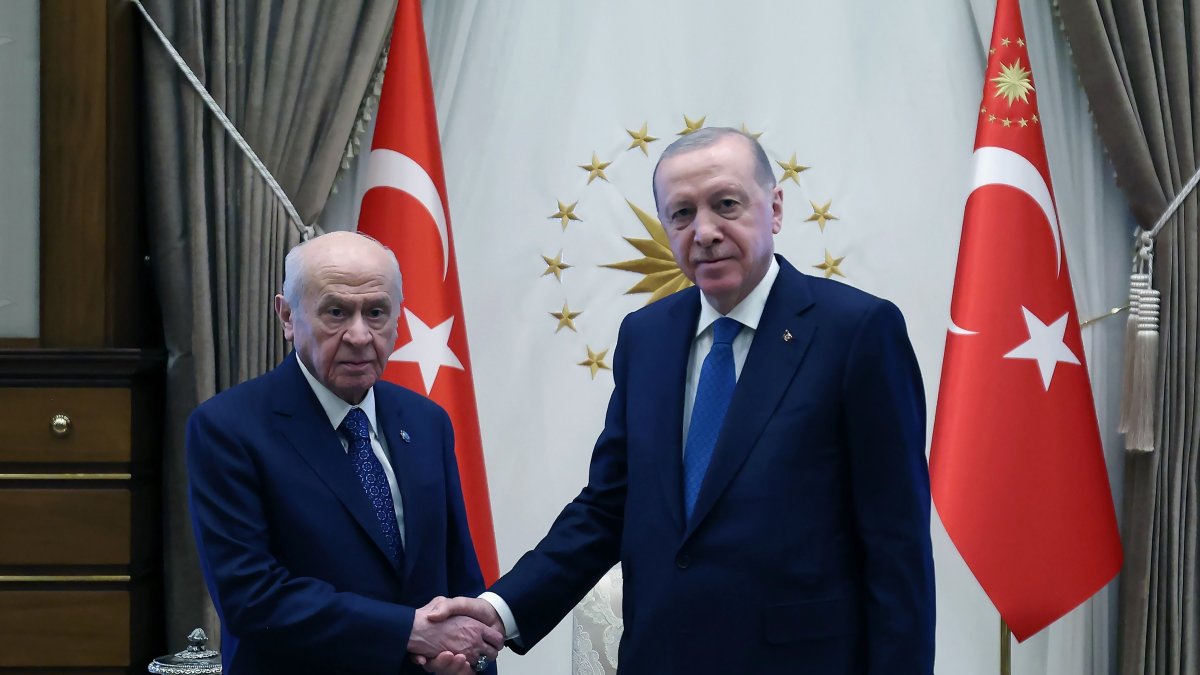 President Recep Tayyip Erdoğan and MHP Chairman Devlet Bahçeli shake hands as they meet at the Presidential Complex in Ankara, April 30, 2026. (DHA Photo)
