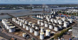 An image made with a drone shows oil, gas and fuel storage units at the Navigator Terminal, Grays, U.K., 14 April 2026. (EPA Photo)