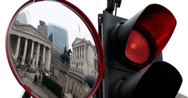 The Bank of England and Royal Exchange buildings are reflected in a road traffic mirror in London, U.K., Feb. 3, 2025. (Reuters Photo)