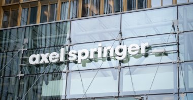 The Axel Springer logo is seen on the company headquarters building in Berlin, Germany, April 20, 2026. (AFP Photo)