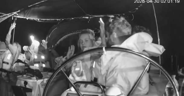 Footage from an onboard camera shows activists waiting with their hands up in the air during an Israeli attack on the Sumud flotilla, April 30, 2026. (DHA Photo) 